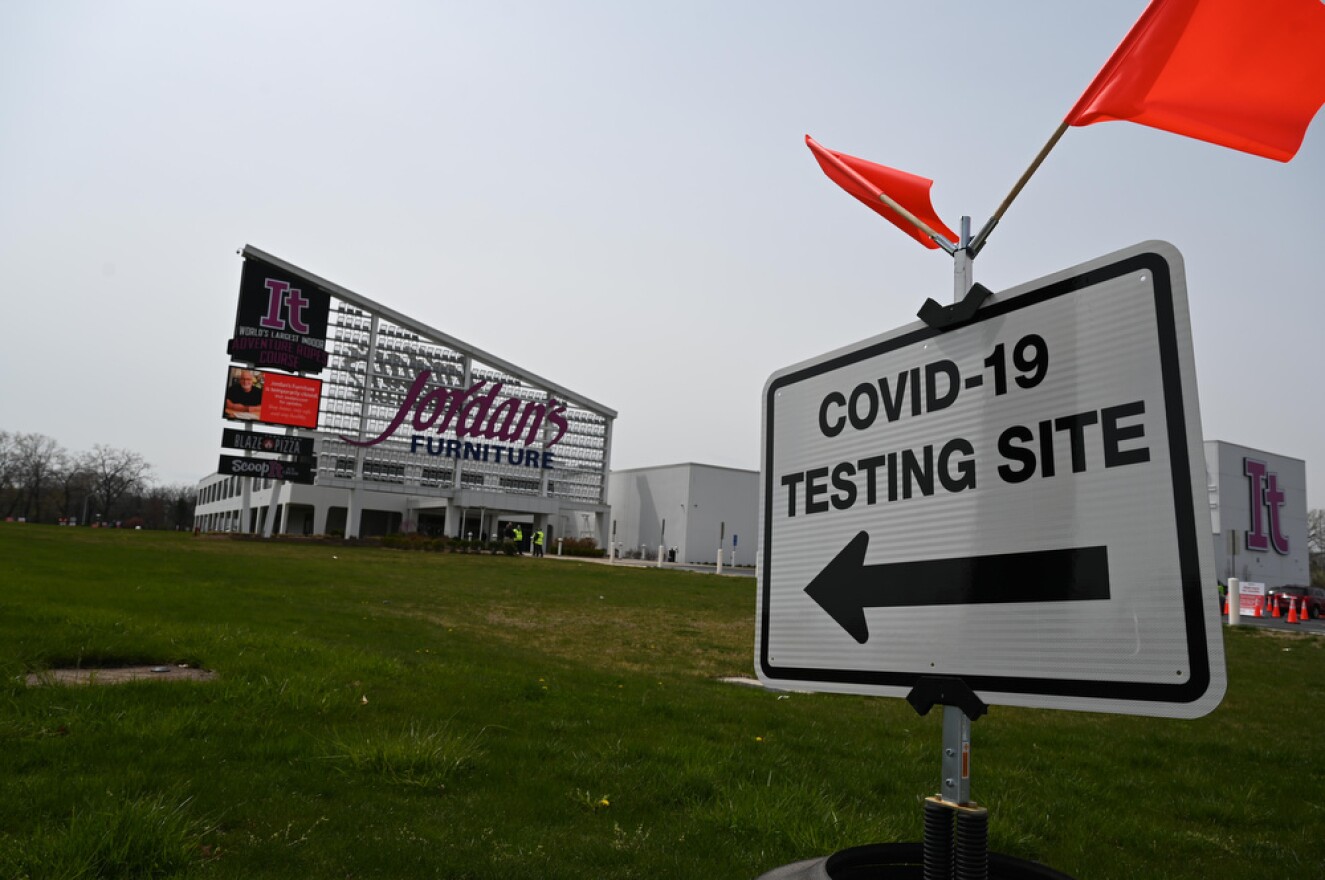 A sign directs traffic for Connecticut's first COVID-19 rapid testing center in New Haven.